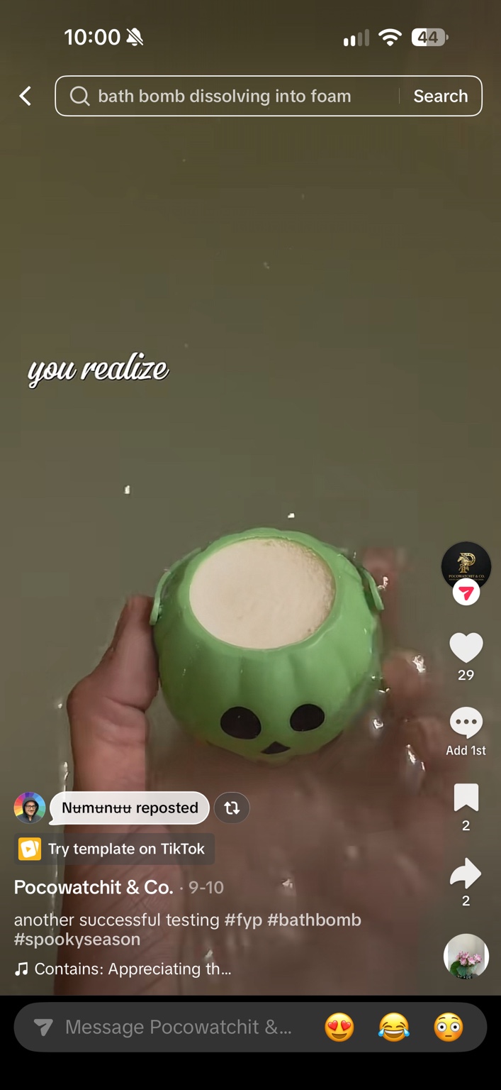 A green pumpkin-shaped bath bomb